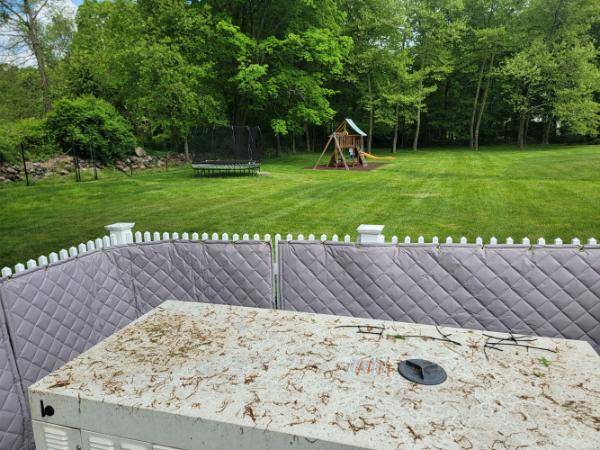 vinyl picket fence with acoustic blankets
