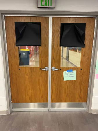 Adjustable door seals installed in a high school