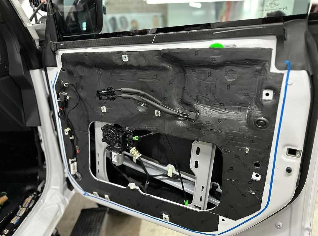 Completed sound deadening installation on a Ford Bronco door