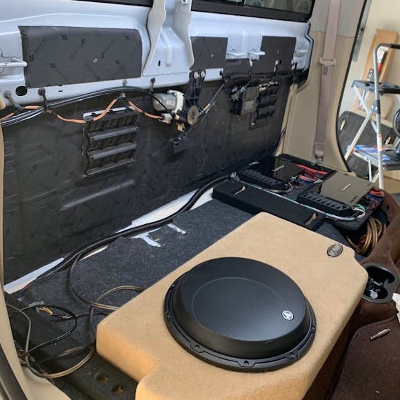Add Damplifier to back wall of truck