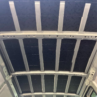 Damplifier Pro Tiles added to the roof of the 2007 Ford Econoline Cargo Van
