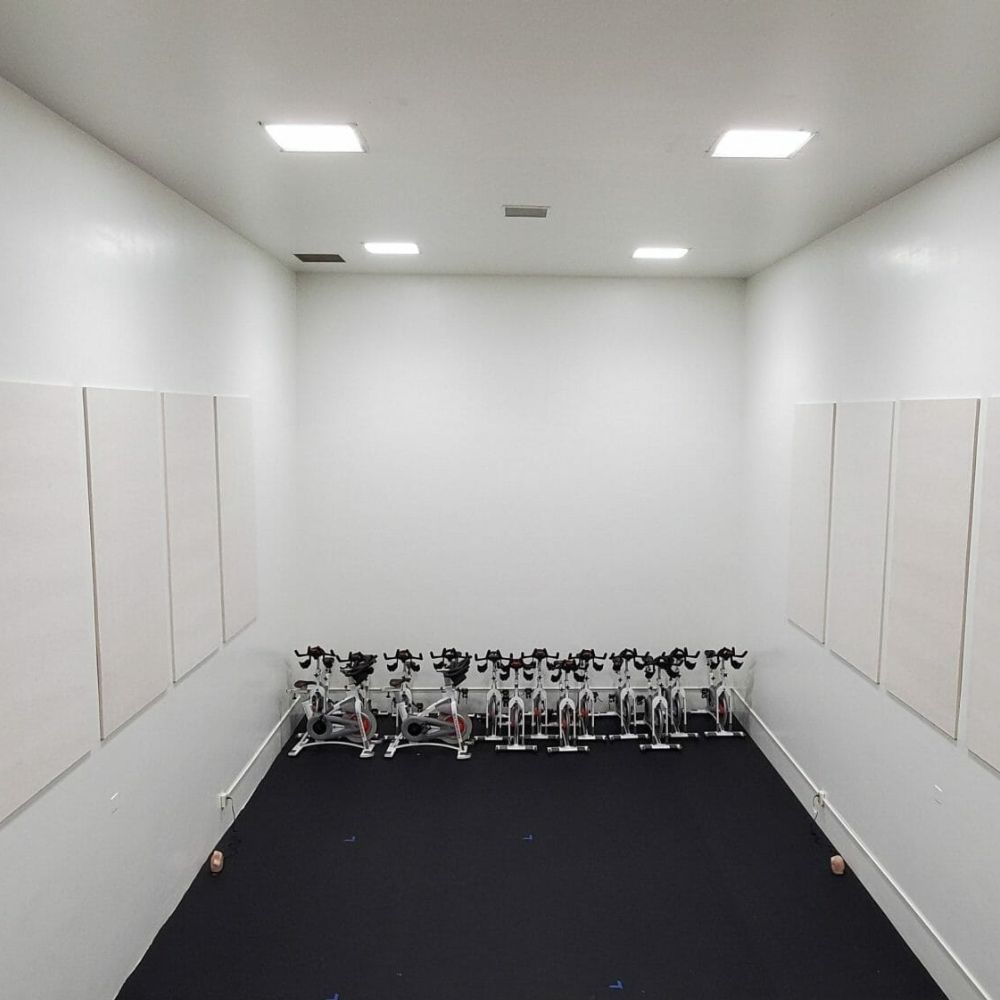 Large White PolyZorbe Acoustic Panels in a Gym