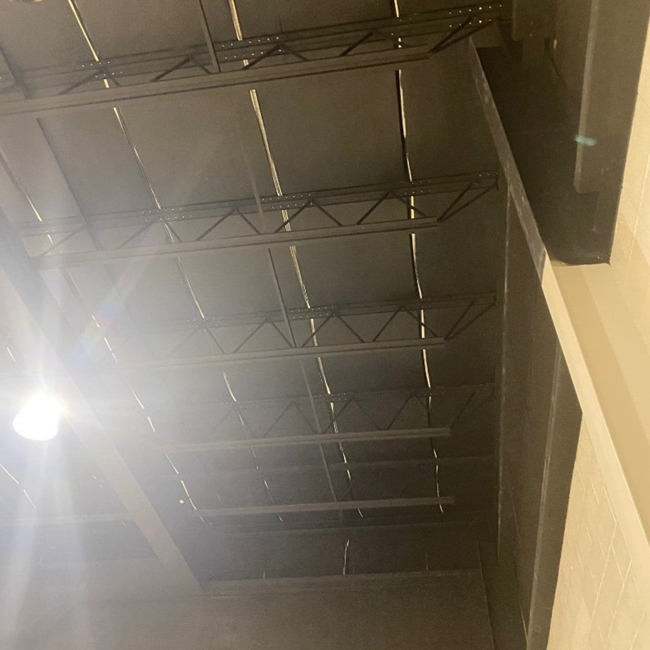 cover a gymnasium ceiling with ecoverb roll to improve sound quality