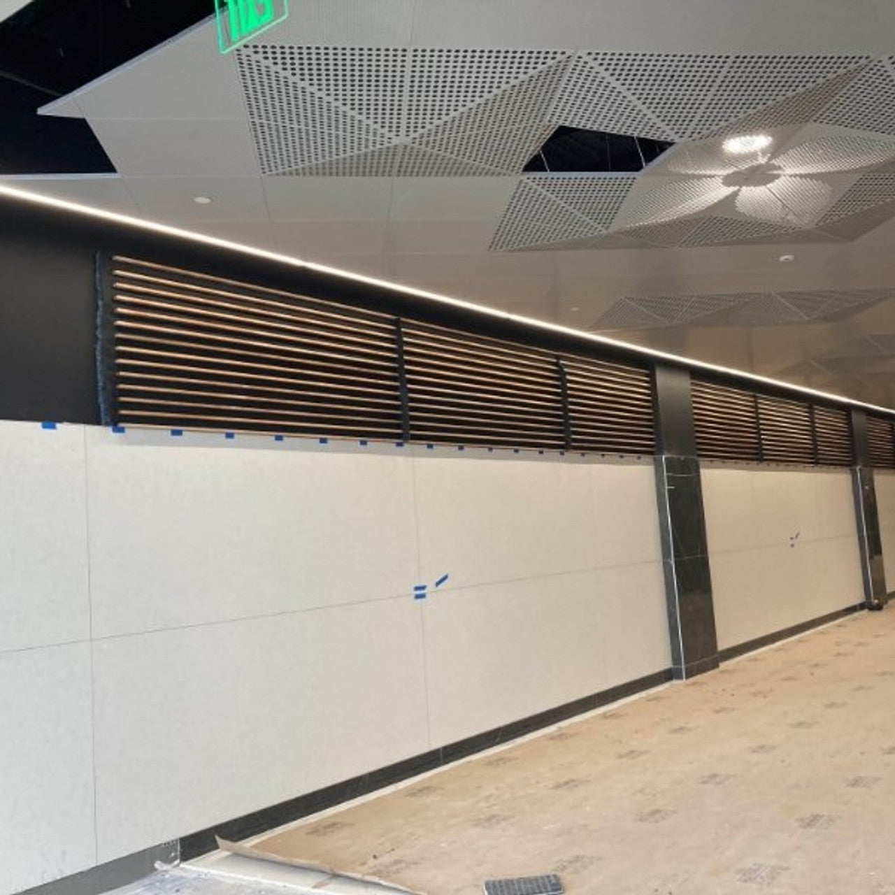 ecoverb roll used behind wood panel design feature as hidden absorption