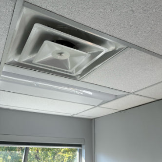 blocknzorbe ceiling tiles (white) installed in a drop ceiling grid with vent cut out