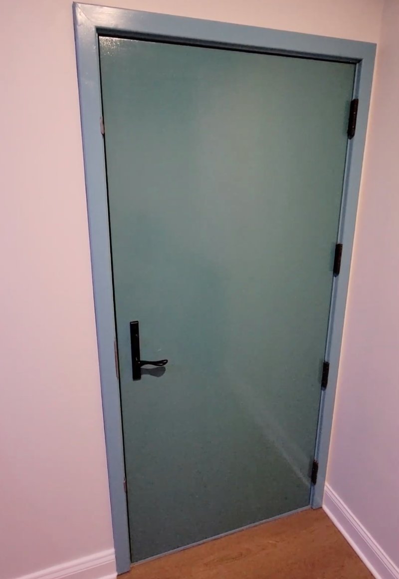 Oak Sound Lock soundproof door painted a light blue