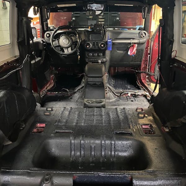 Spectrum Sludge cargo area of SUV