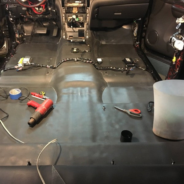Clean cutouts in Luxury Liner Pro MLV automotive barrier for re-attaching seats