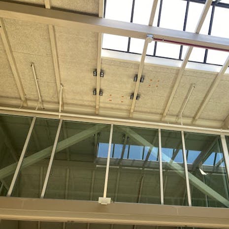 Timberwool primed white installed on ceiling atrium