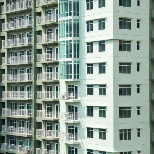 Multifamily residential apartment building exterior, soundproofing application context