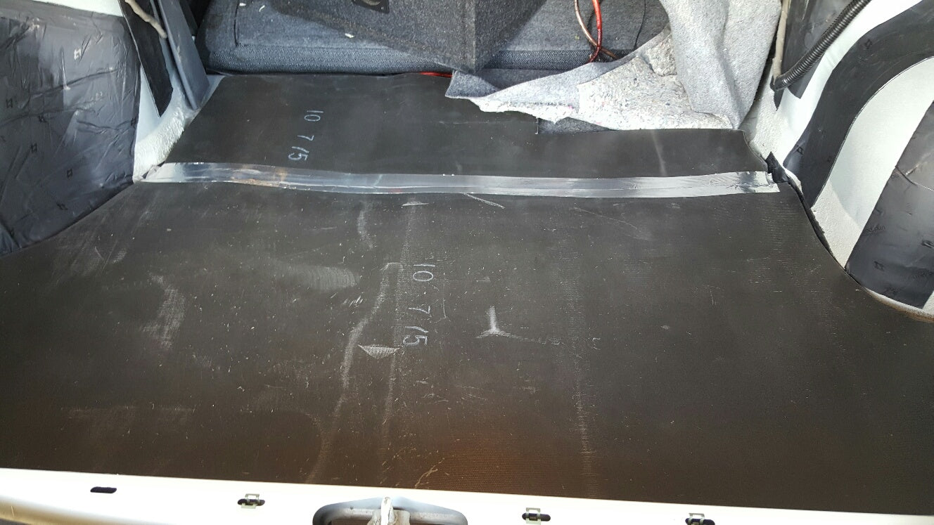Damplifier Pro sound deadening sheets installed in Chevy Cavalier trunk floor