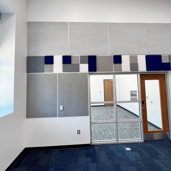Office with fabric wrapped panels of different thicknesses