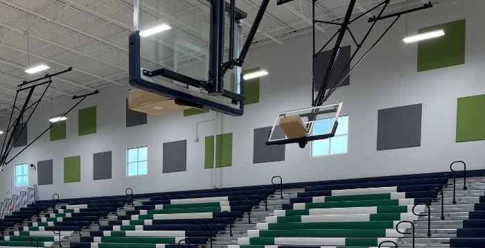 gymnasium with fabric wrapped panels on the walls