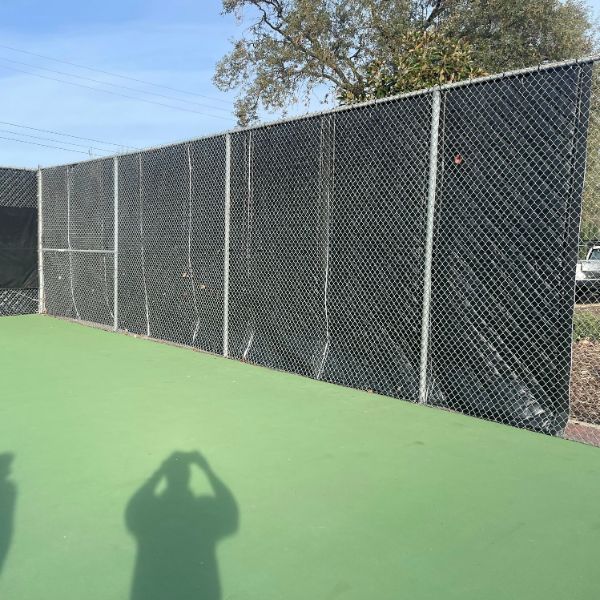 Quiet Quilt Soundproof blankets installed around a pickleball court