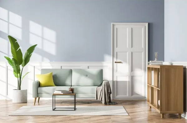 Bright living room with white paneled interior door, ideal for Sound Lock door soundproofing seals installation