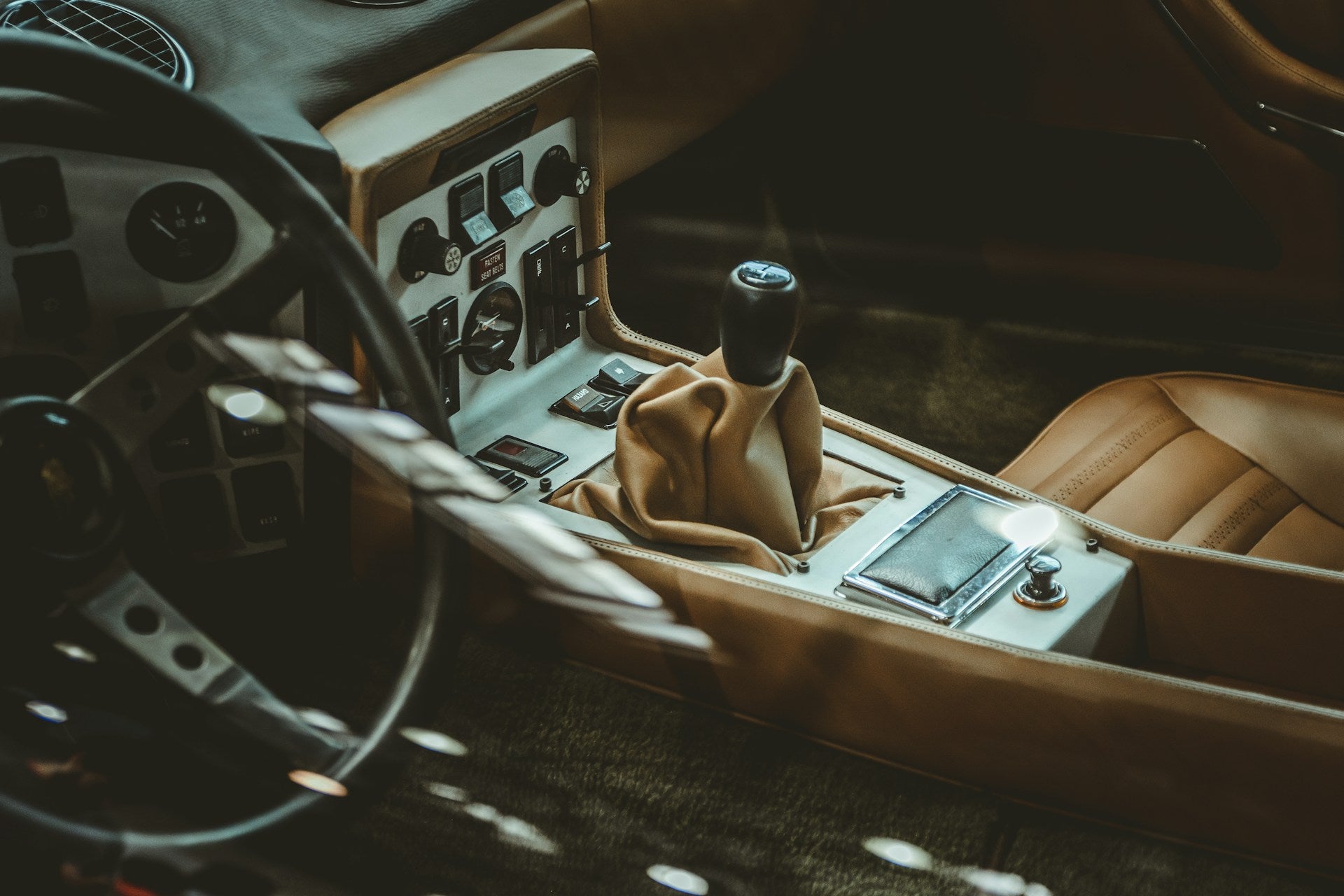 Classic car interior center console before Damplifier Pro sound deadening installation