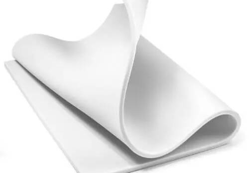 Mega Zorbe hydrophobic melamine foam sheet, white, shown partially folded to display flexibility