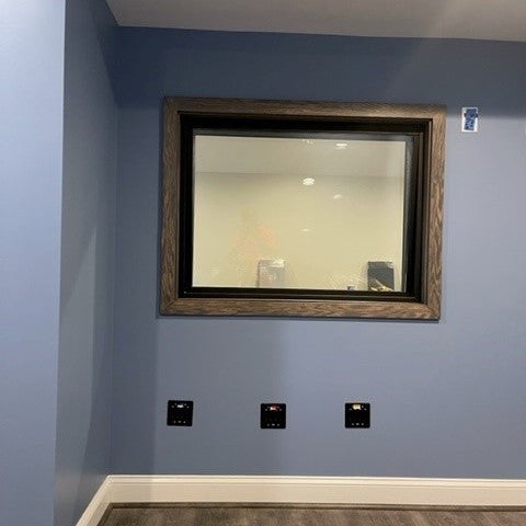 Soundproof windows added to a home recording studio
